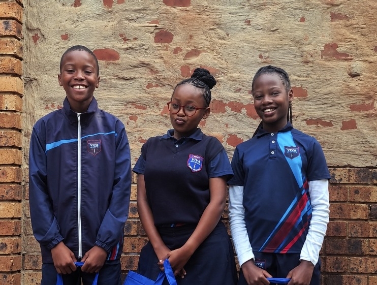 Three learners at Viva Primary School, Rustenburg